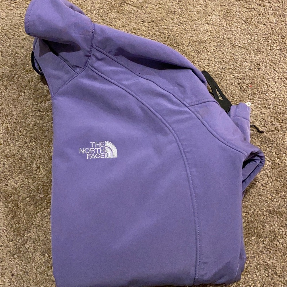 Women’s North Face purple jacket.